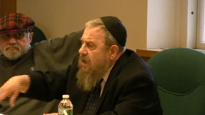 
	Watch Rabbi Dr. Immanuel Schochet’s clever response to a paper delivered at the Sinai Scholars Symposium. He exposes the fundamental flaw in biblical criticism and the meaninglessness of religion without acceptance of Divine revelation.